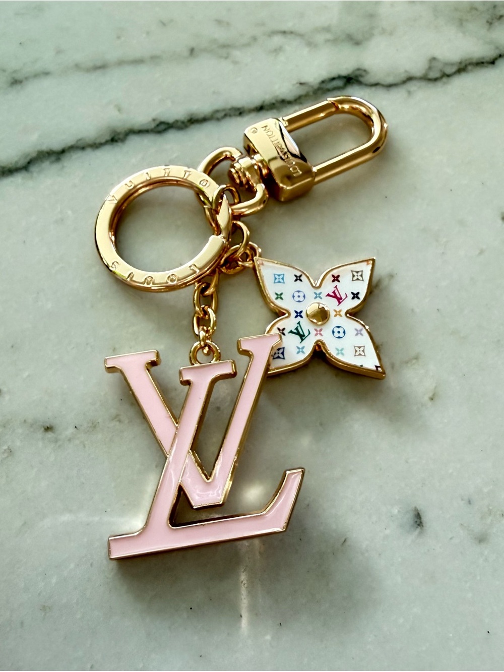 Pink enamel logo and gold tone keychain purse charm